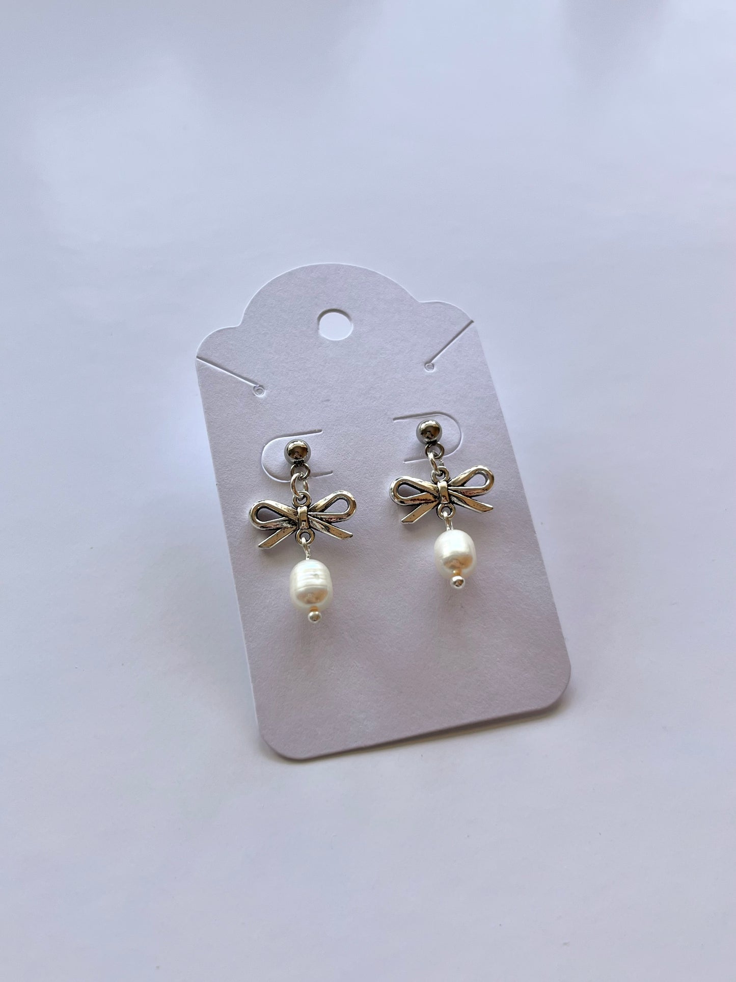 pearly bow earrings